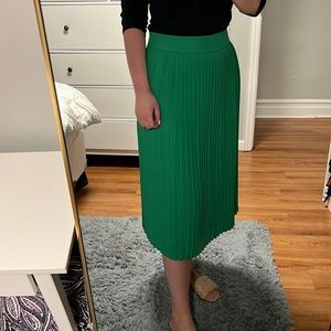 Green pleated midi skirt